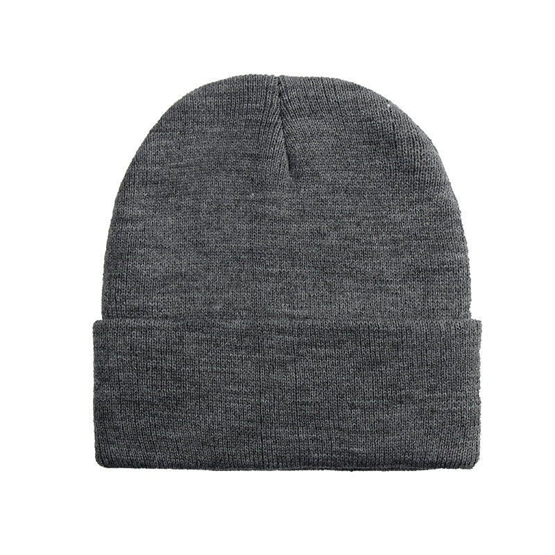 Promotional stretch knit beanies with rolled cuff