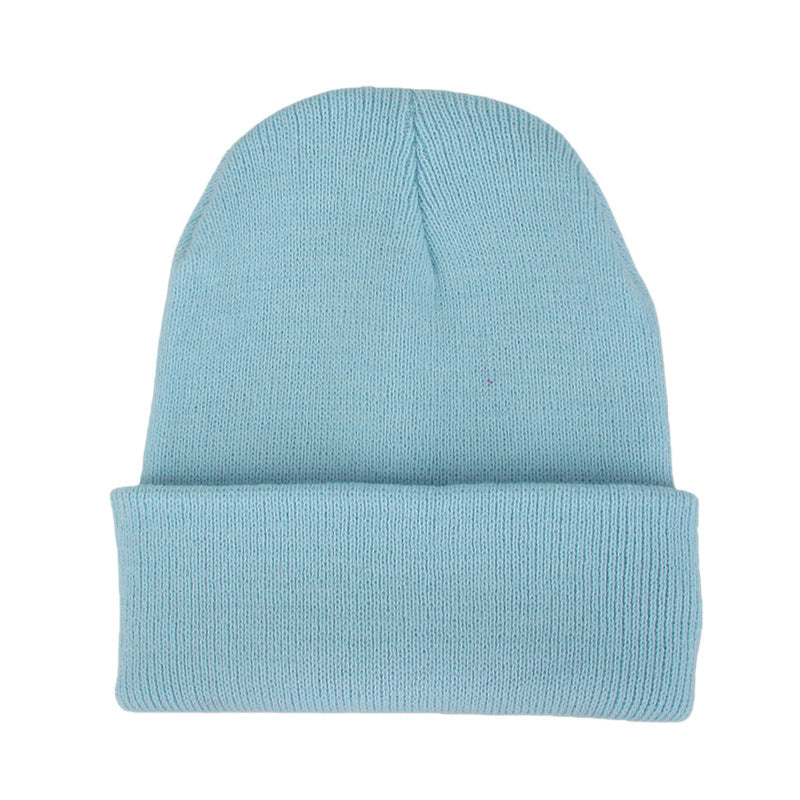 Promotional stretch knit beanies with rolled cuff