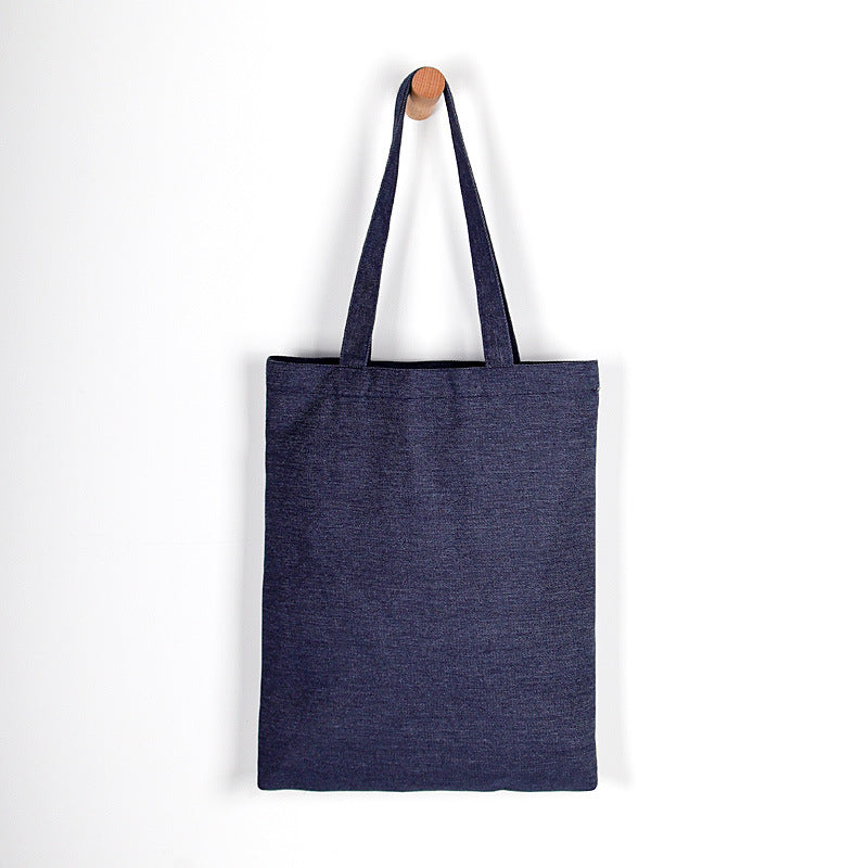 Denim bag with interior pocket and long handles, 300 g/m²