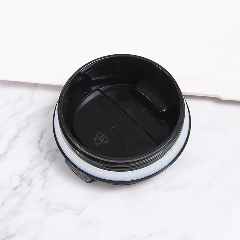 Insulated stainless steel tumbler with black lid and silver rim, 350ml 