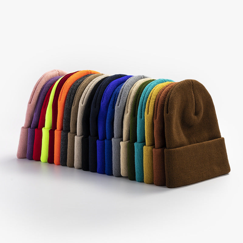 Promotional stretch knit beanies with rolled cuff