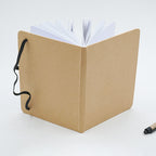 A5 notebook personalized with recycled logo, elastic closure, black lined pages, EcoNote